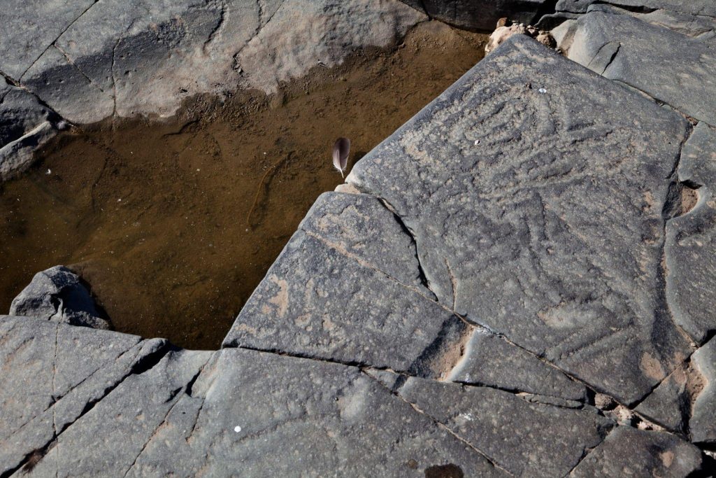 Petroglyphs and Grinding Holes: Mystical Culinary Connection